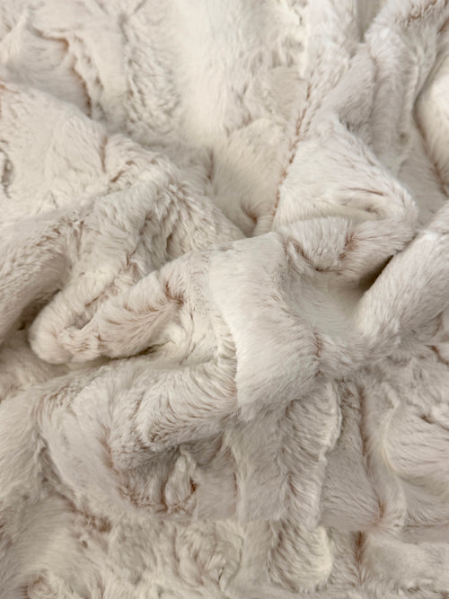 Oat Milk cat blanket draped to show its raised plush texture